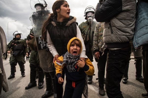 Ivan Romano small children crying surrounded by police