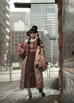 Pasha Style Woman standing in Tokyo with pink clothes