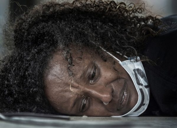 Brian Cassey women crying while protesting