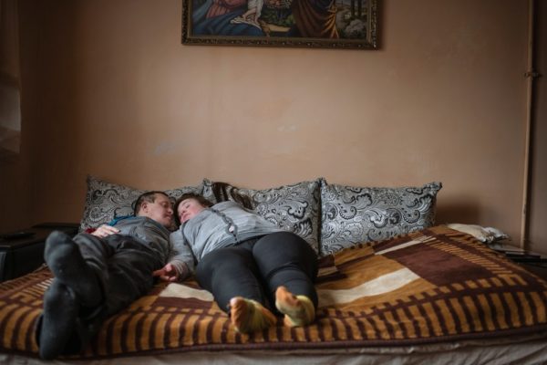 Oleksandr Rupeta couple laying in bed
