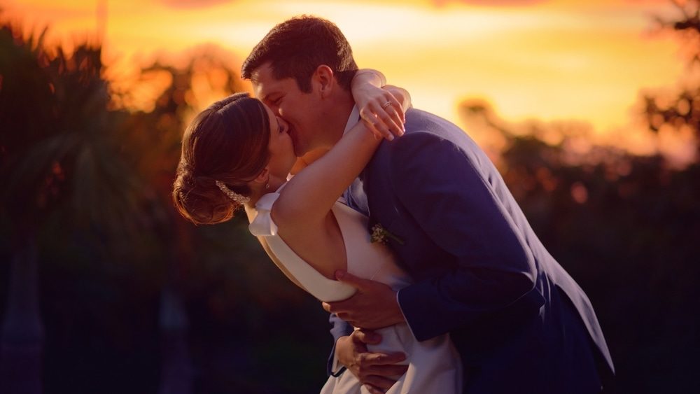 Enrique Mancera newlywed kissing in the sunset