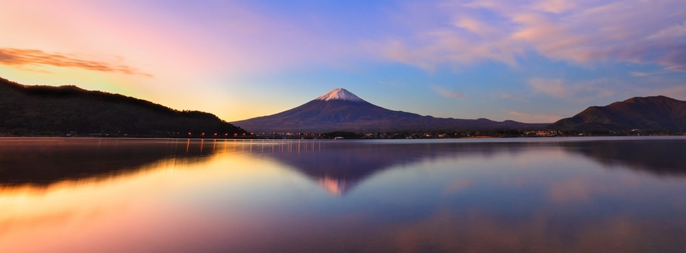 mount Fuji by a lake