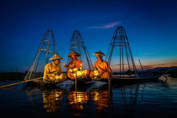 fishermen on the sea at night